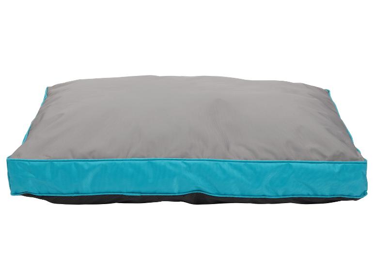 Coussin pour chien gris et turquoise.