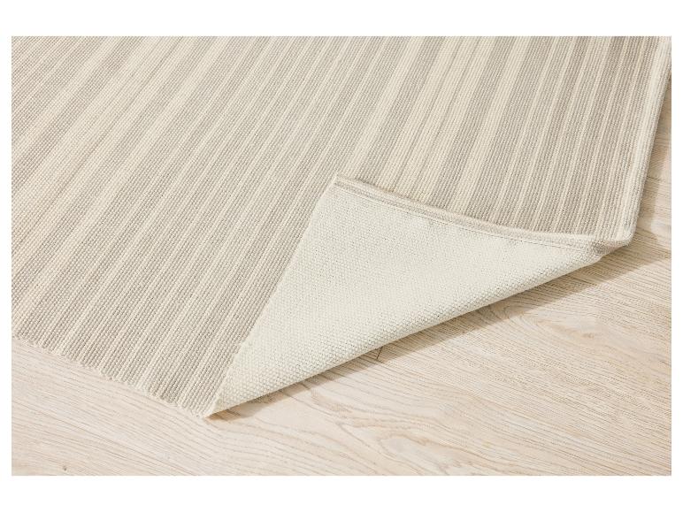 Tapis rayé beige clair, détail du tissage.