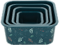 Ensemble de boîtes de rangement gigognes rectangulaires bleu foncé avec motif de feuilles et de baies.