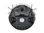 Robot aspirateur SilverCrest : vue inférieure, brosses latérales et roues.