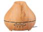 Diffuseur d'huiles essentielles en bois clair avec boutons de commande