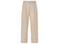 Pantalon beige à jambe droite.