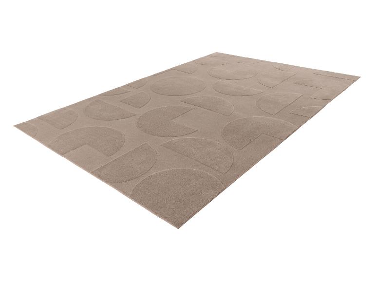 Tapis rectangulaire beige avec motifs géométriques de demi-cercles et de cercles