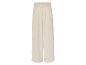 Pantalon blanc ample avec ceinture élastique.