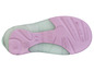 La semelle d'une paire de chaussures pour bébé rose et verte de la marque Ippilù.
