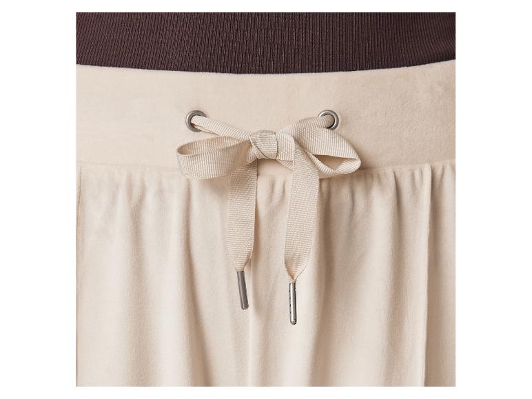 Pantalon en velours beige avec cordon.