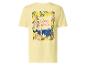 T-shirt jaune avec imprimé d'un village côtier encadré de citrons et de fleurs, avec le texte « Ciao Bella ».