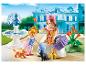 Ensemble Playmobil avec princesse, enfant, chats et fontaine devant un palais.