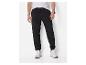 Pantalon de survêtement noir homme avec cordon de serrage, t-shirt blanc et baskets