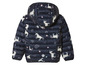 Une veste matelassée pour fille en bleu marine avec un motif d'licornes.