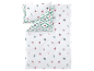 Parure de lit blanche à motifs de Noël avec housse de couette et taie d'oreiller.