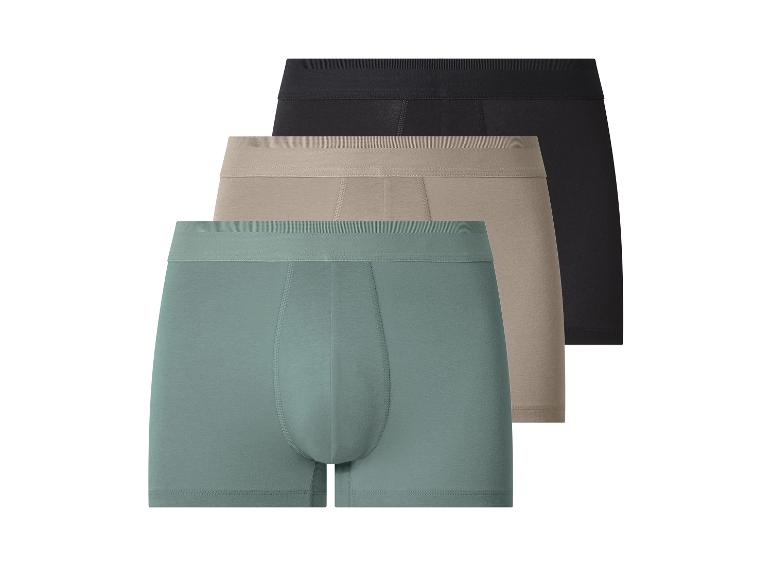 Lot de trois boxers pour hommes : noir, beige et sarcelle.