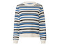 Pull en maille blanc avec des rayures bleues et noires.