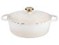 Cocotte en fonte émaillée crème avec couvercle et bouton doré