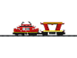 Train jouet rouge sur rails avec un wagon de transport de voitures.