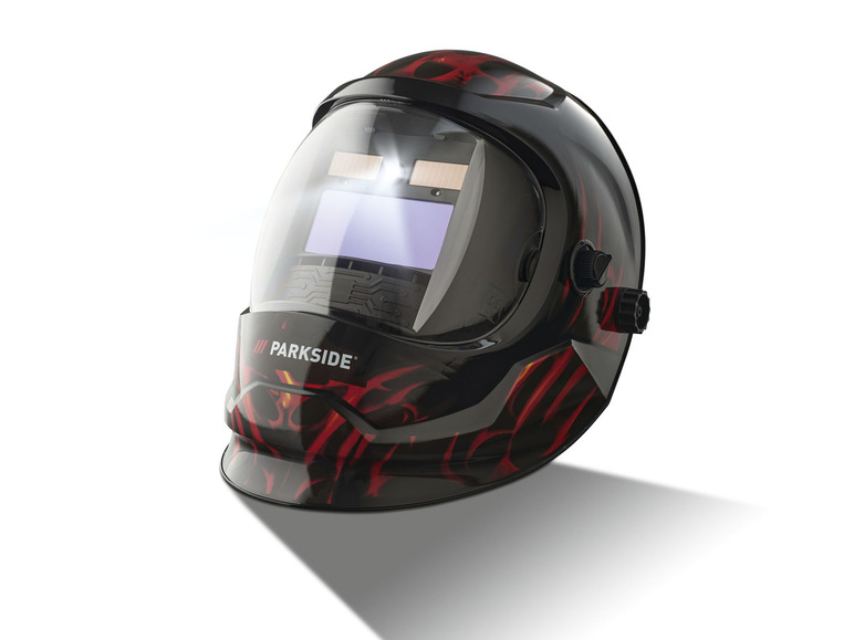 Un masque de soudeur noir avec des flammes rouges et le logo Parkside.