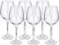 Six verres à vin transparents avec de longues tiges et de larges bols sur fond noir.