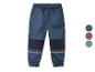 Pantalon softshell enfant bleu foncé avec détails.