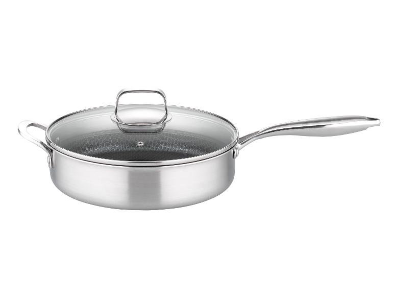 Une casserole en acier inoxydable avec un couvercle en verre.