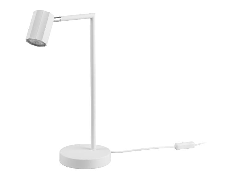 Une lampe de bureau moderne blanche aux lignes simples.