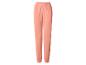 Pantalon de jogging couleur pêche avec taille et chevilles élastiques.