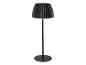 Lampadaire noir avec abat-jour plissé et base ronde.