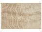 Tapis de bain beige moelleux.