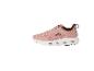 Sneakers roses avec semelle blanche.