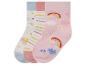 Trois paires de chaussettes à motif arc-en-ciel pour filles.