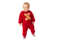 Bébé en ensemble de Noël en peluche rouge avec un bonhomme de pain d'épices