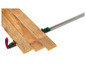 Des planches de bois assemblées avec des serre-joints Festool.