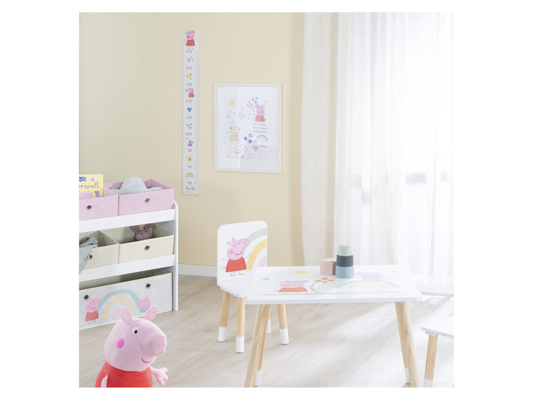 Une table et une chaise Peppa Pig avec des rangements.