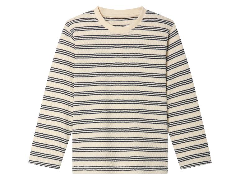 Pull à rayures beige et bleu marine à manches longues.