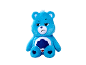 Ours en peluche bleu avec une expression faciale triste