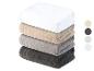 Une pile de serviettes de toilette en blanc, beige, gris et gris foncé.