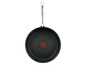Une poêle noire Jamie Oliver Tefal avec un fond pointillé.