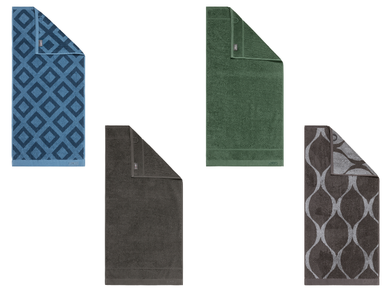 Quatre serviettes de bain LOOKS de couleurs et motifs variés.