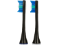 Deux têtes de brosse à dents électriques de rechange avec des poils bleus et verts