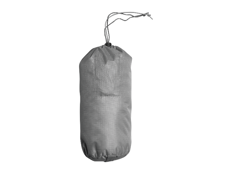 Sac de compression gris pour équipement de camping.