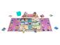 Un jeu Gabby's Dollhouse avec un plateau de jeu, des cartes et des figurines.