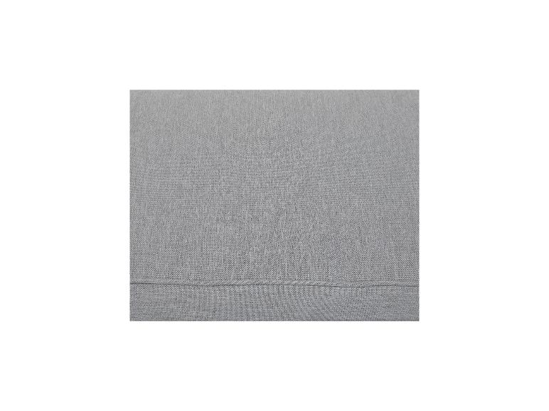 Détail de rembourrage en tissu gris, comme un coussin de canapé ou de pouf