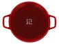 Cocotte ronde rouge avec poignées et icônes de compatibilité pour plaques de cuisson