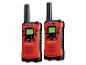 Deux talkies-walkies rouges et noirs avec écrans et boutons, dont 'TALK' et 'MON'.