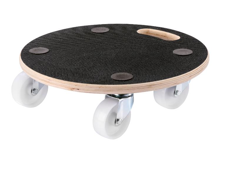 Un chariot rond en bois pour meubles avec une surface antidérapante noire et quatre roulettes blanches.