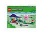 Ensemble LEGO Minecraft avec un sanctuaire animalier, incluant un loup domestique, un mouton, une vache et un lapin.