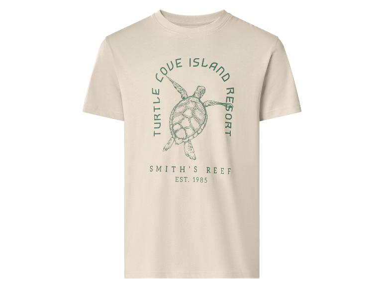 T-shirt beige clair avec un motif de tortue verte et le texte « TURTLE COVE ISLAND RESORT SMITH'S REEF EST. 1985 ».