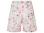 Short blanc à imprimé floral rose.