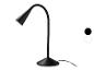 Lampe de bureau noire avec bras flexible et base ronde.