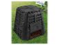 Composteur de jardin noir avec compost, sur herbe verte
