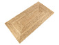 Un tapis en jute tissé avec un aspect naturel.